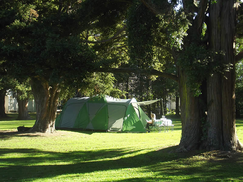 Mature taking a campsite shower